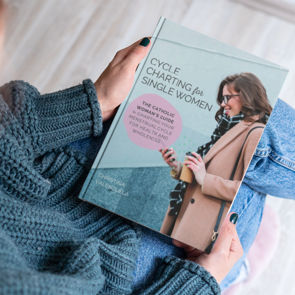 Woman wearing green sweater, jeans, and pink slippers holding a book Cycle Charting for Single Women with a cover photo of a woman wearing a scarf and coat holding coffee and looking at her phone