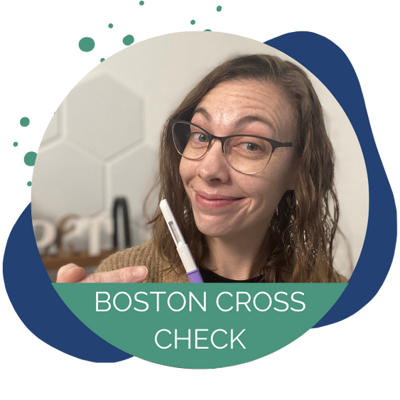 Christina holds a clearblue monitor test stick in front of the words Boston cross Check