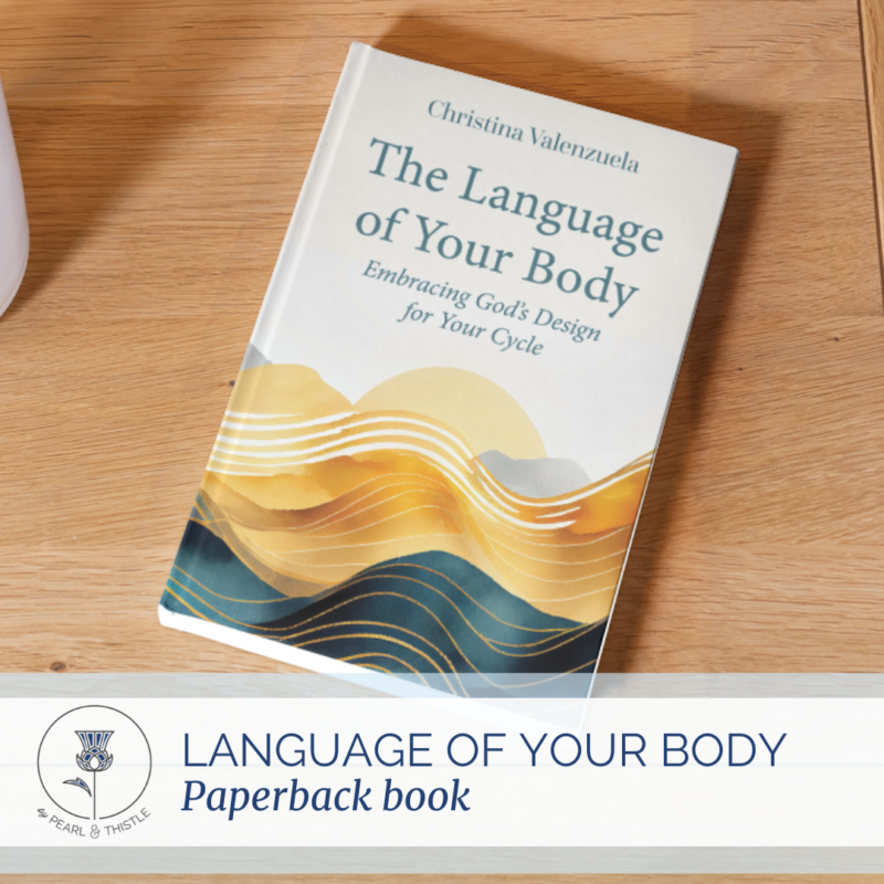 book on table. title reads, "The Language of Your Body: Embracing God's Design for Your Cycle"