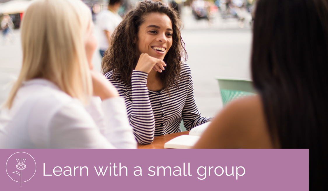 women chat at a cafe table, text reads learn with a small group